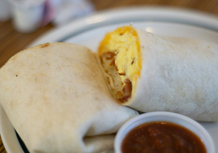 Burrito with eggs, cheese, and salsa